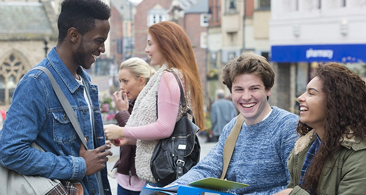 Students socialising in town centre